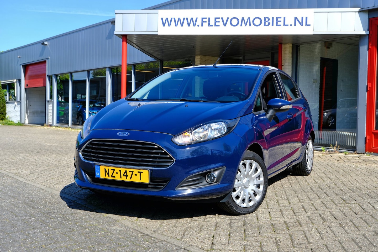 Ford Fiesta - 1.25 Titanium 5-drs Airco|Regensensor|Cruise - AutoWereld.nl
