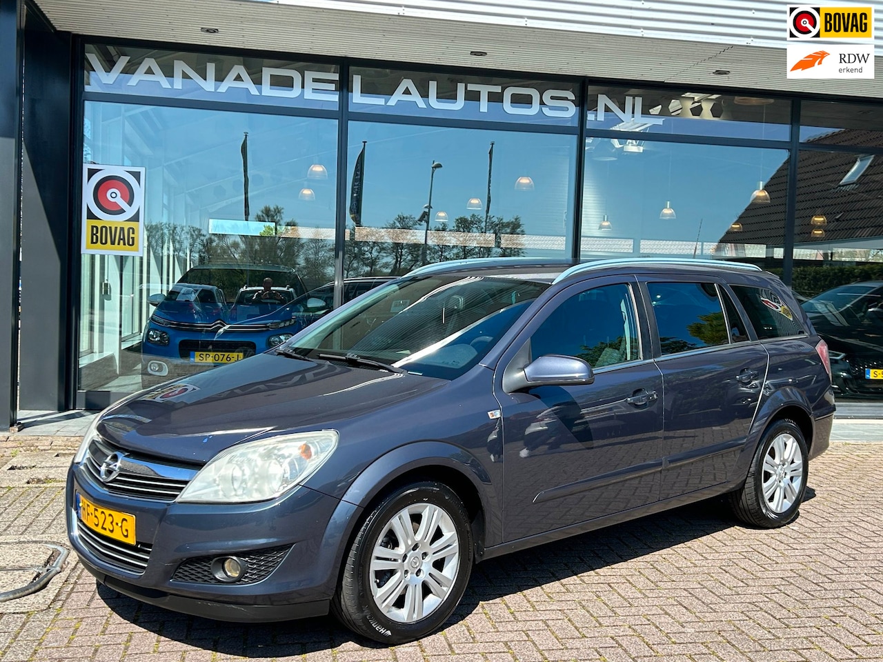 Opel Astra Wagon - 1.6 Essentia Airco Cruise Trekhaak Dealeronderhouden! - AutoWereld.nl