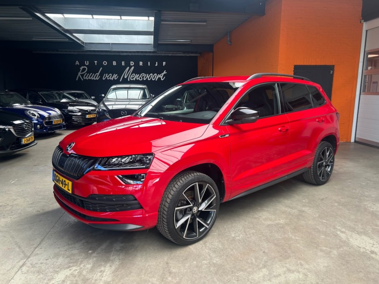 Skoda Karoq - 1.5 TSI SPORTLINE / Trekhaak / 19inch / Camera - AutoWereld.nl