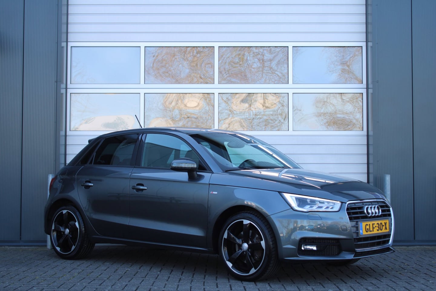 Audi A1 Sportback - 1.4 TFSI Sport 5-Deurs S-Line 125pk Clima/Cruise/Keyless/Bi-Xenon/PDCv+a/Navi/Bluetooth/LE - AutoWereld.nl