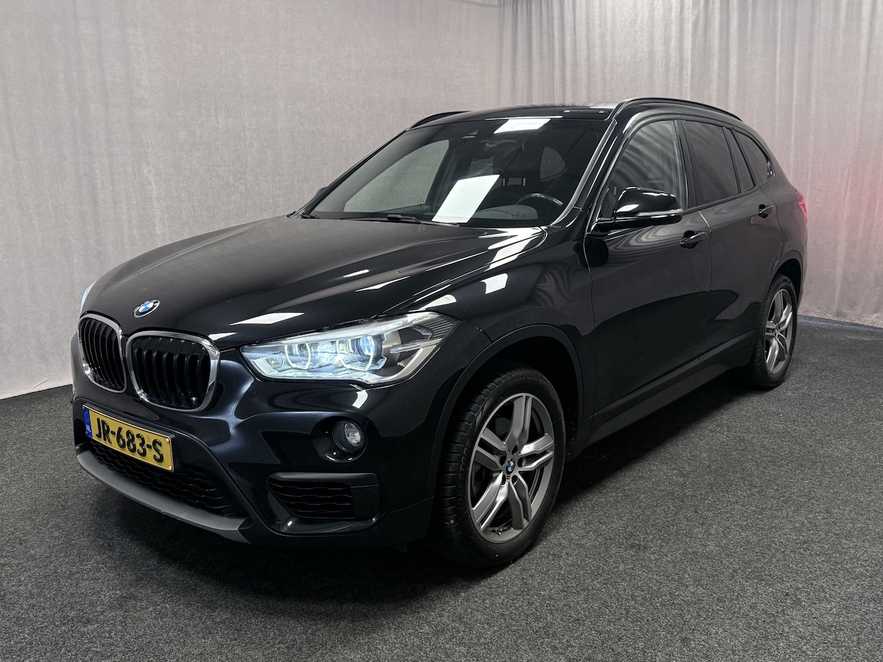 BMW X1 - sDrive18i Centennial Executive | Trekhaak | Leer | Navi | 18" M velgen | - AutoWereld.nl