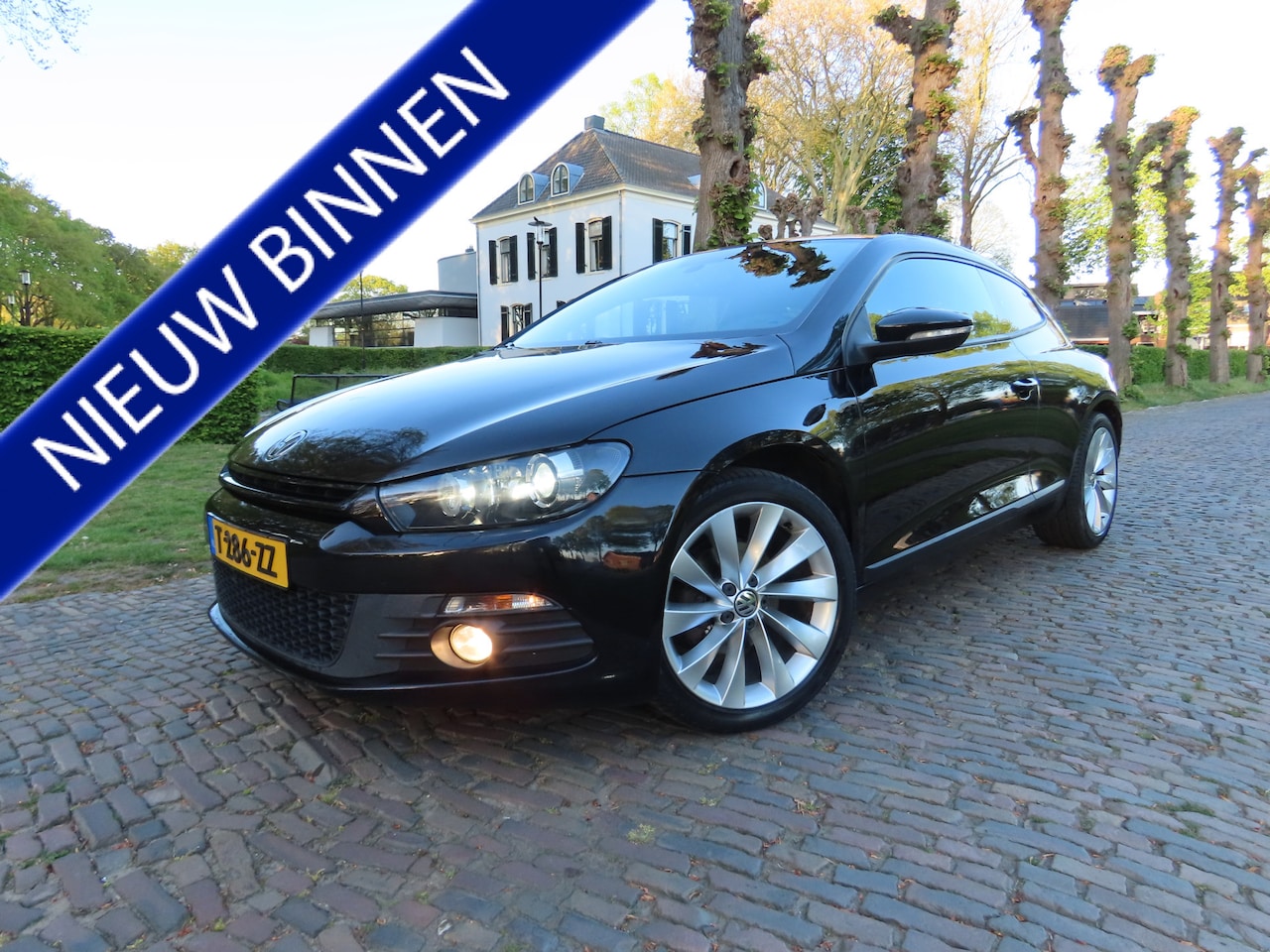 Volkswagen Scirocco - 1.4 TSI Highline Ecc Cruisecontrol Stoelverwarming Sportstoelen Navigatie Keyless Pdc Lm V - AutoWereld.nl