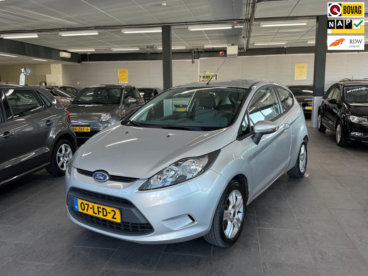 Ford Fiesta - 1.25 Limited airco elektrische pakket lm-velgen parkeersensoren 137 dzkm nl auto - AutoWereld.nl