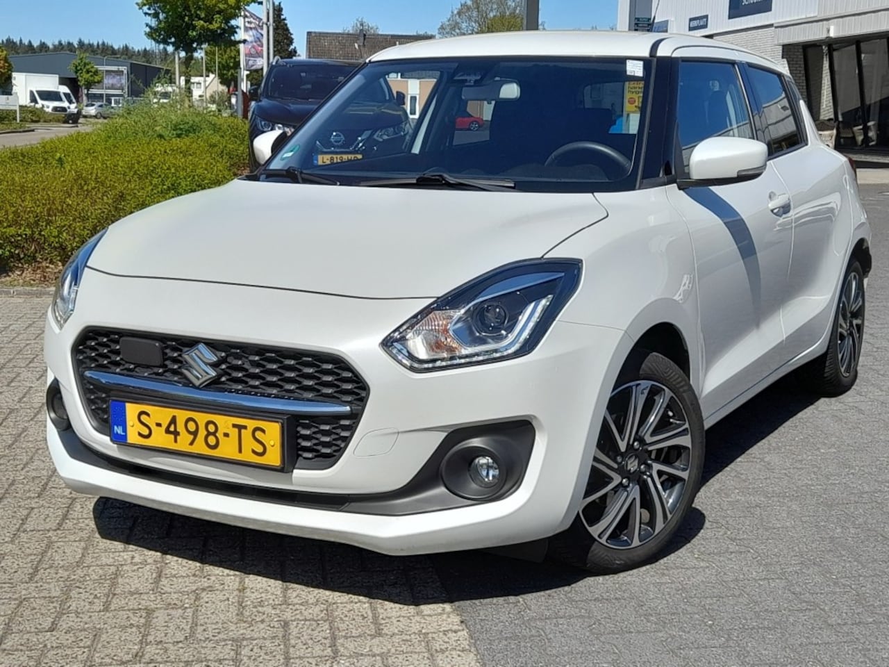 Suzuki Swift - 1.2 STYLE SMART HYBR. KEYLESS ECC CAMERA CARPLAY NAVI ADD. CRUISE - AutoWereld.nl