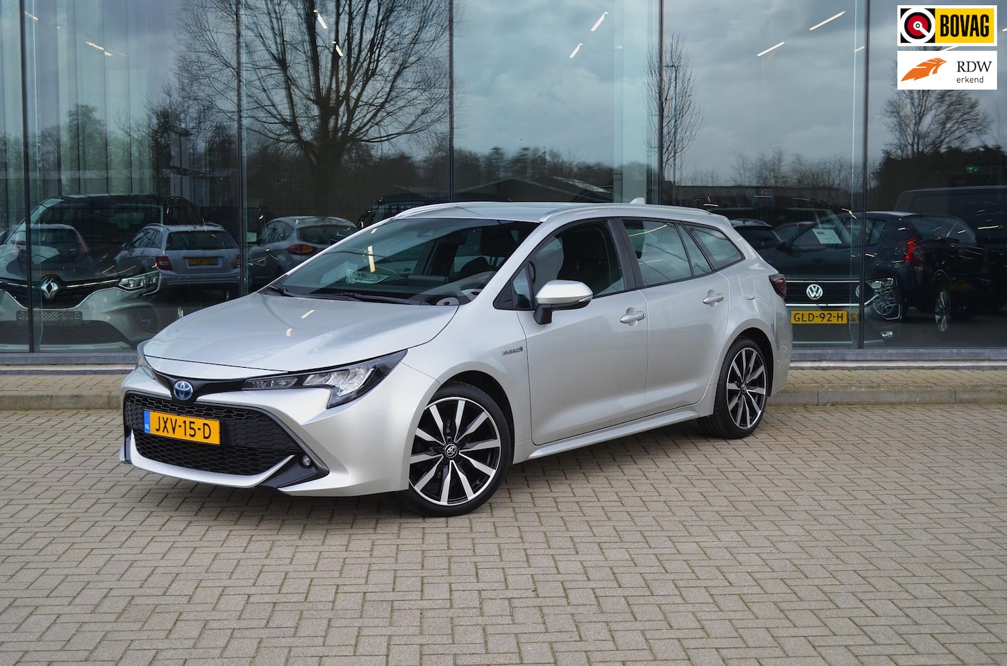Toyota Corolla Touring Sports - 1.8 Hybrid | Trekhaak | Stoelverw. | Camera | Navi | Voorruit verwarming - AutoWereld.nl
