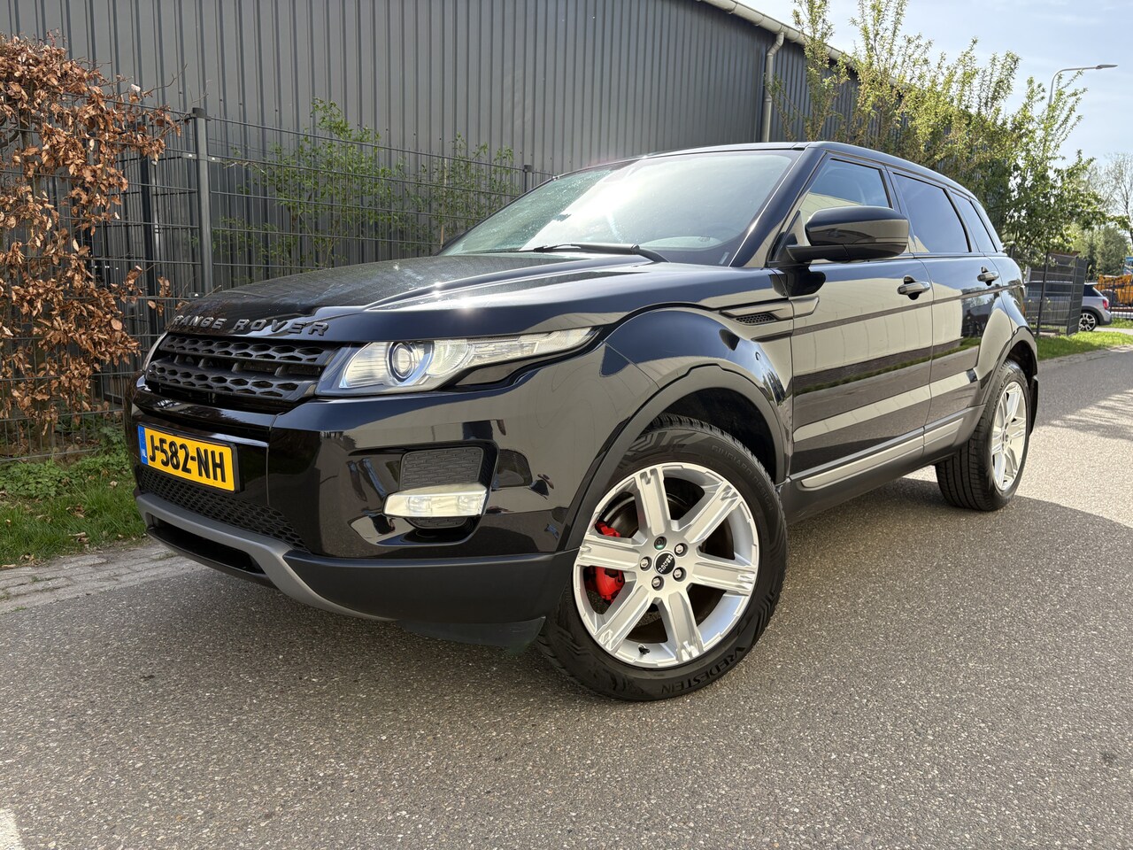 Land Rover Range Rover Evoque - 2.0 Si 4WD Prestige / AUTOMAAT / CRUISE / LEER / 137dkm! - AutoWereld.nl