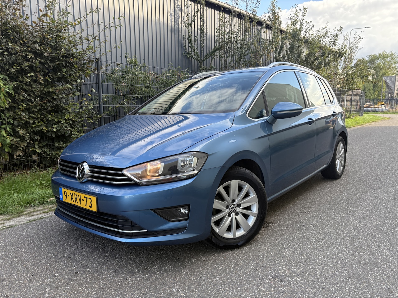 Volkswagen Golf Sportsvan - 1.2 TSI Highline / AUTOMAAT / NAVI / CRUISE - AutoWereld.nl