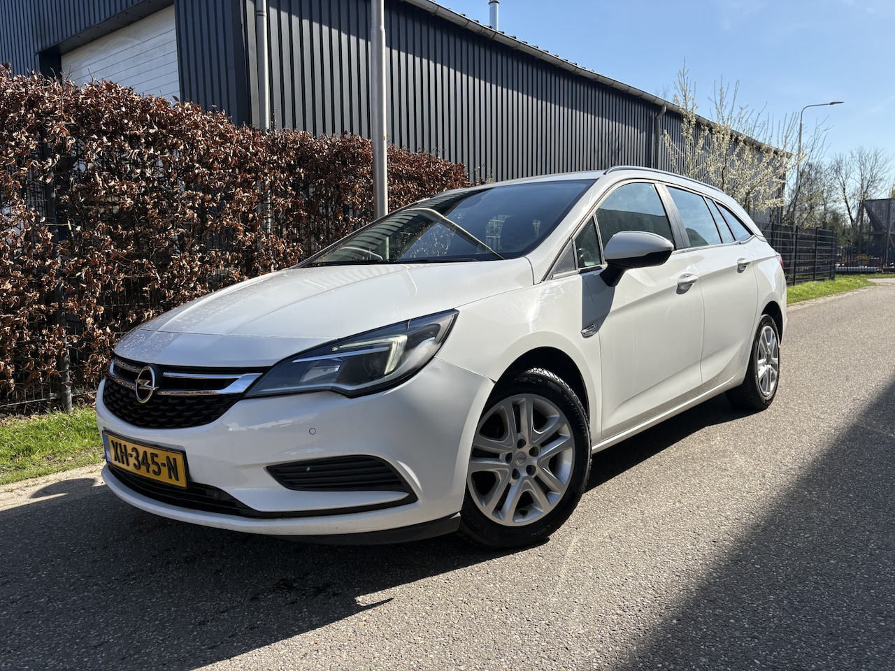 Opel Astra Sports Tourer - 1.0 Turbo Online Edition / NAVI / AIRCO / CRUISE - AutoWereld.nl