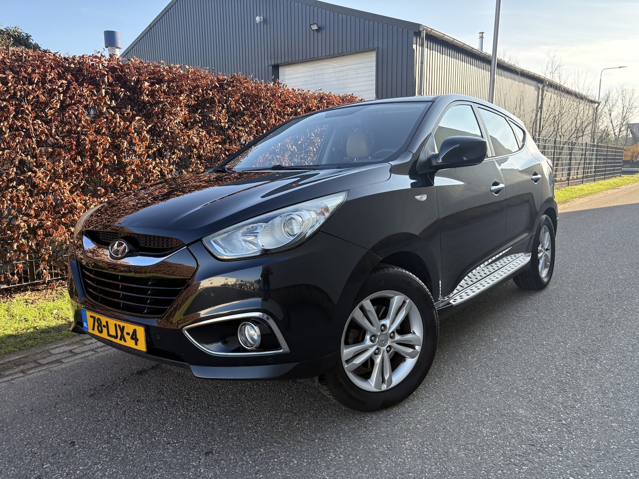 Hyundai ix35 - 2.0i Dynamic / NAVI / LEER / AIRCO / CRUISE - AutoWereld.nl