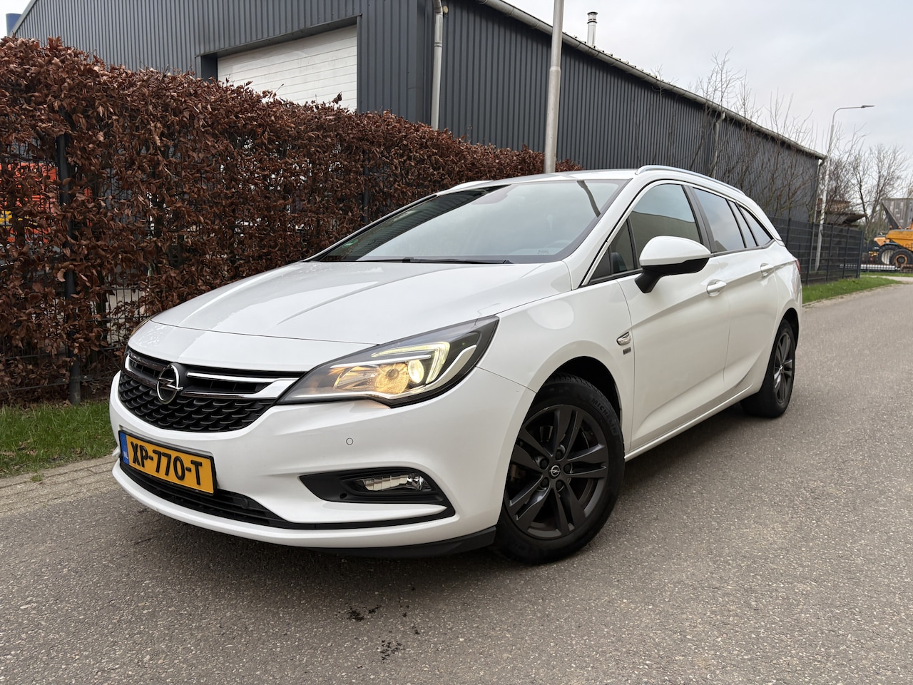 Opel Astra Sports Tourer - 1.0 Turbo 120 Jaar Edition / AIRCO / NAVI / CRUISE / INCL BTW - AutoWereld.nl