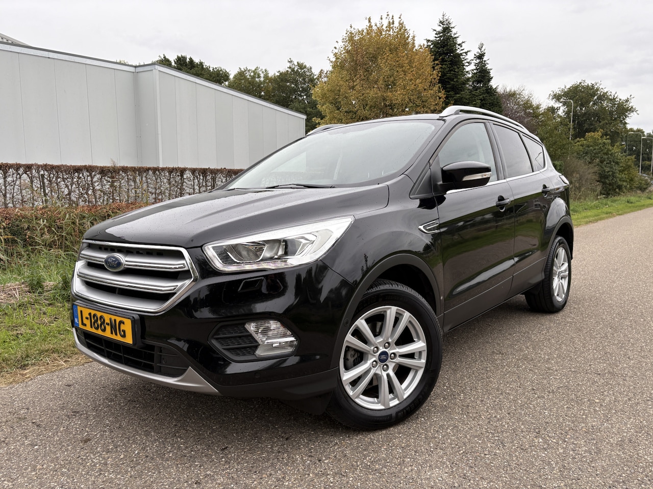 Ford Kuga - 1.5 Titanium / NAVI / AIRCO ECC / CRUISE / 159dkm! - AutoWereld.nl