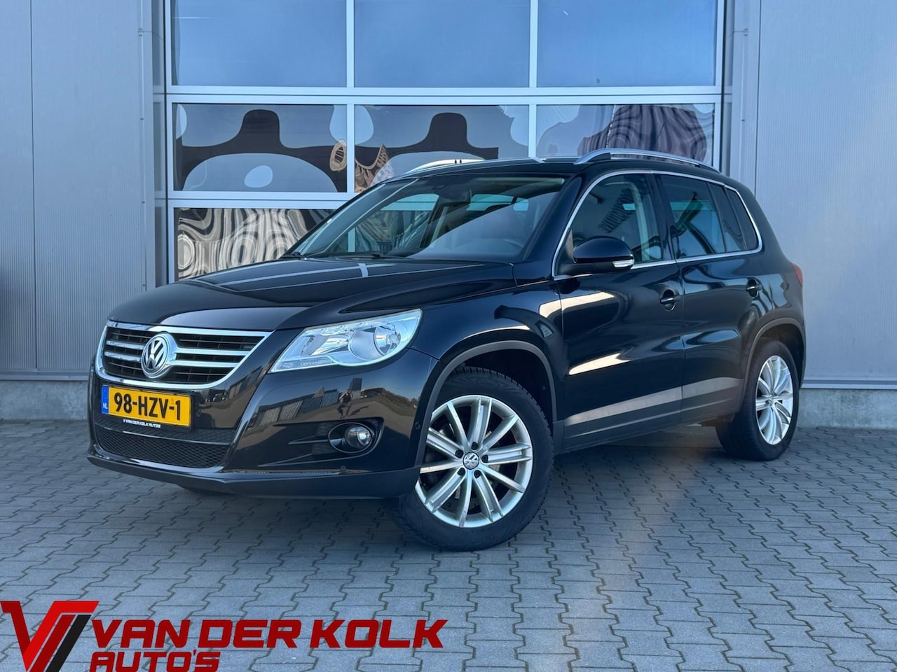 Volkswagen Tiguan - 2.0 TSI Track&Field 4Motion | Leder | Cruise | Climate | Stoelverwarming | Sensoren - AutoWereld.nl
