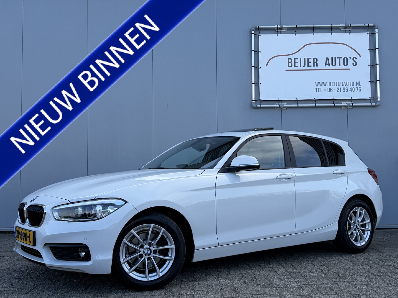 BMW 1-serie - 118i High Executive Automaat/Schuifdak/Trekhaak/Leer. - AutoWereld.nl