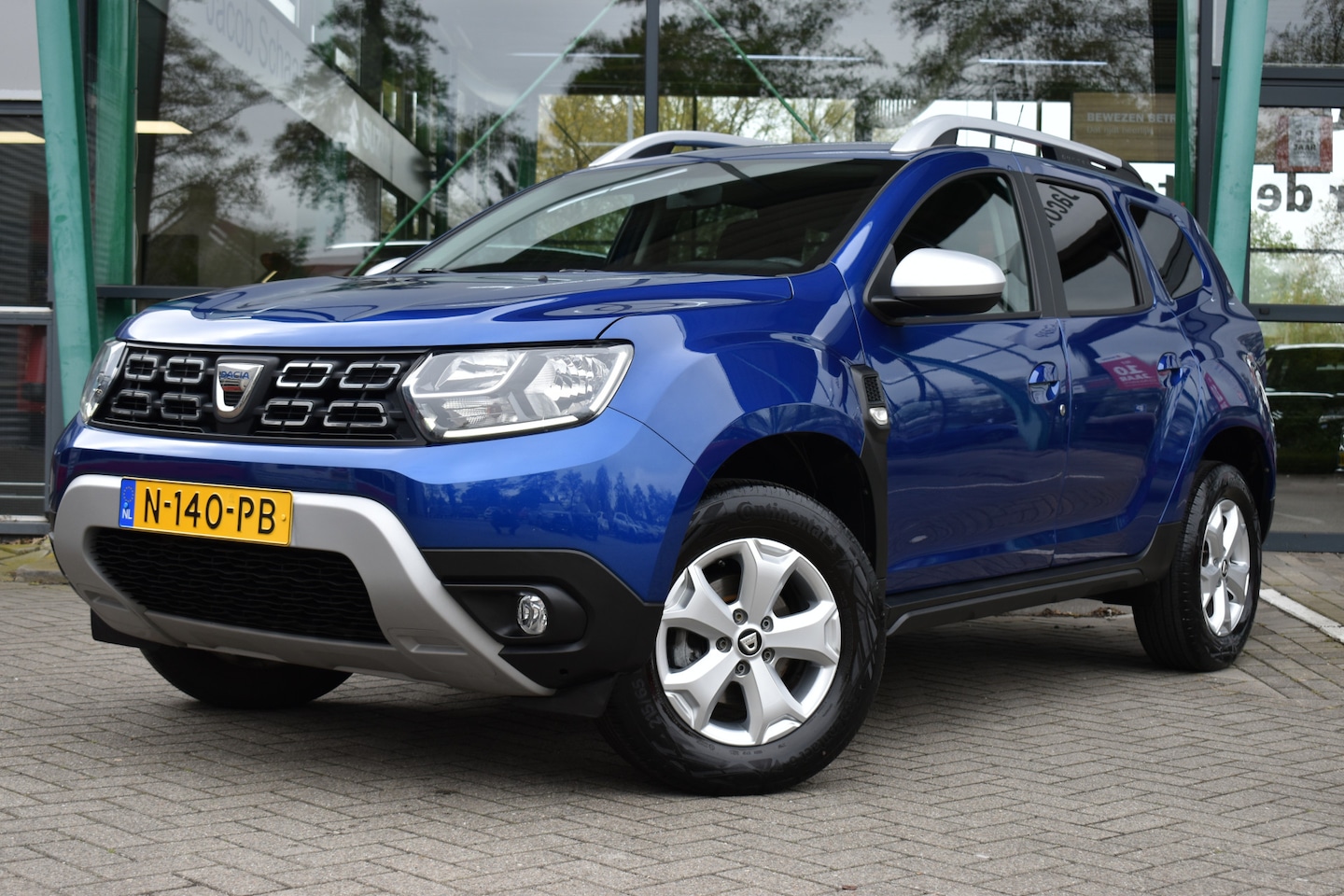 Dacia Duster - 1.0 TCe Comfort 92pk | Airco | Cruise Control | NL-Auto | - AutoWereld.nl