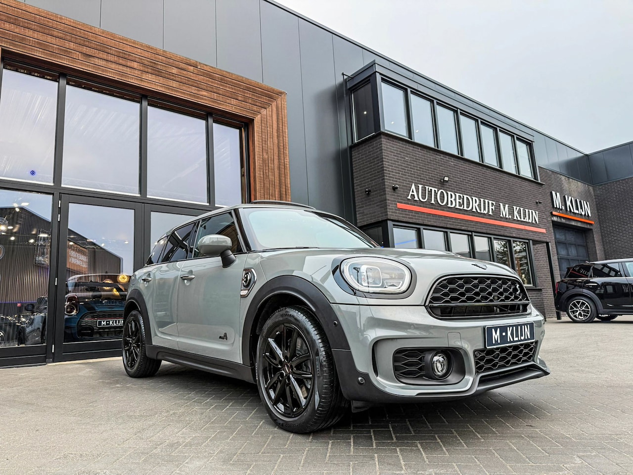 MINI Countryman - Mini 1.5 Cooper S E ALL4 John Cooper Works 220pk/Nardo/Pano/Camera/Jcw stoelen - AutoWereld.nl