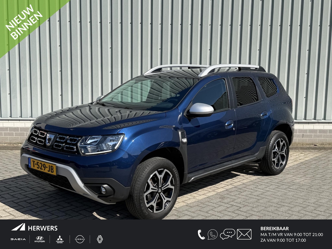 Dacia Duster - 1.3 TCe Tech Road / Trekhaak 1500 KG / Navigatie / Camera / Cruise Control / Airco / Apple - AutoWereld.nl