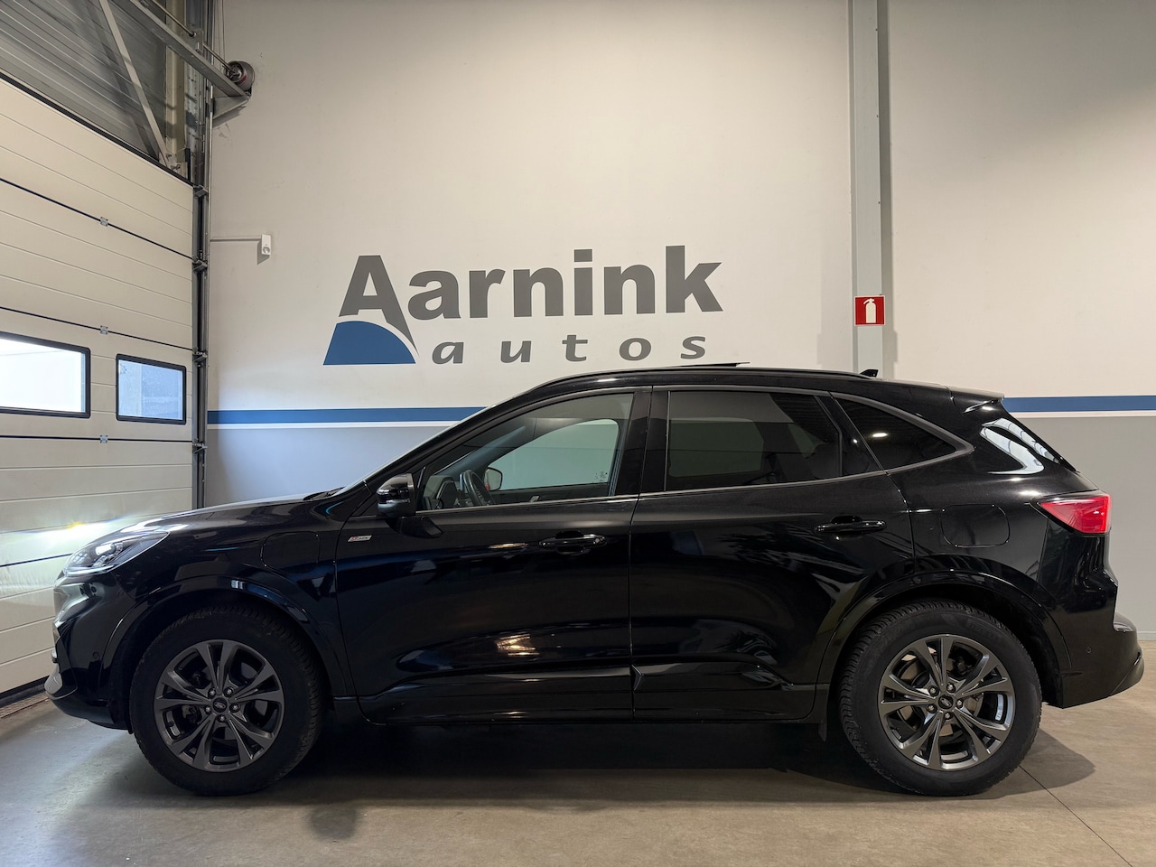 Ford Kuga - 2.5 Phev 225 pk ST-Line X driverpack, technopack, winterpack, B&O sound, camera, lederen b - AutoWereld.nl