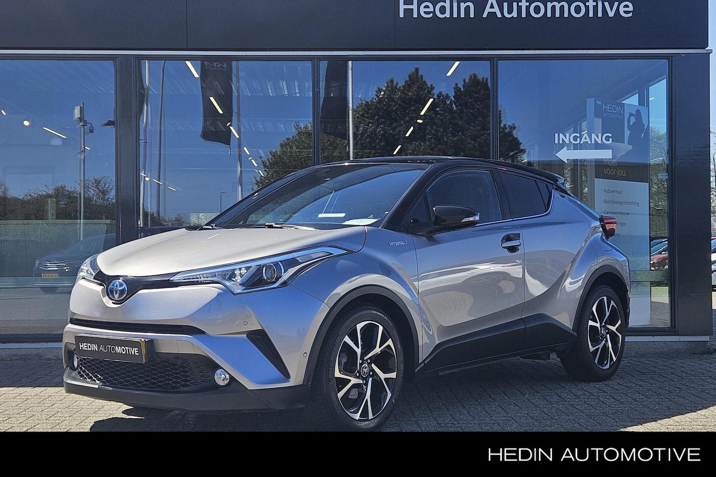 Toyota C-HR - 1.8 Hybrid Bi-Tone | Leder | Stoel- en stuurverwarming | 18" velgen | Adaptieve Cruise Con - AutoWereld.nl