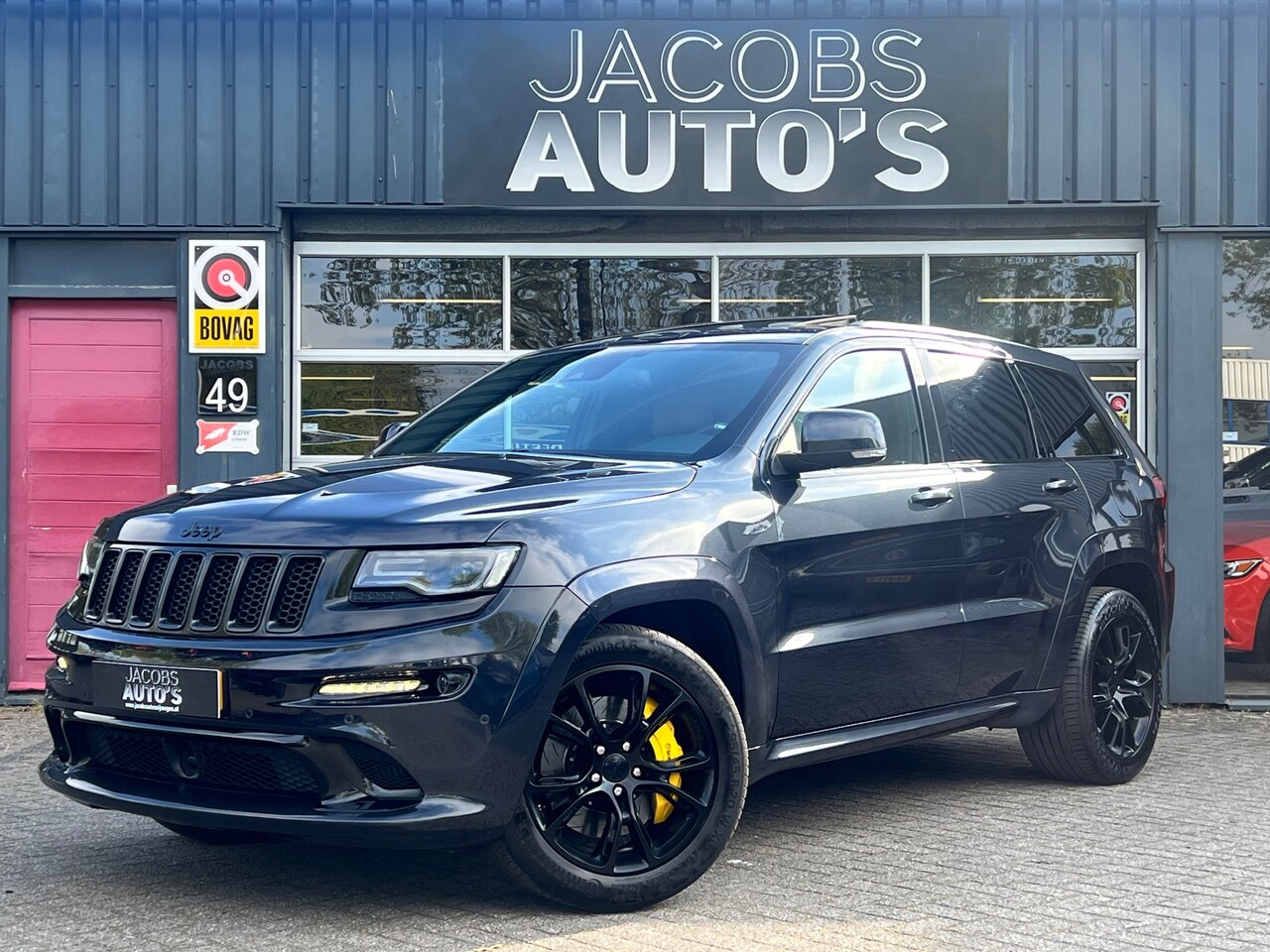 Jeep Grand Cherokee - 6.4 V8 SRT8 grijskenteken - AutoWereld.nl