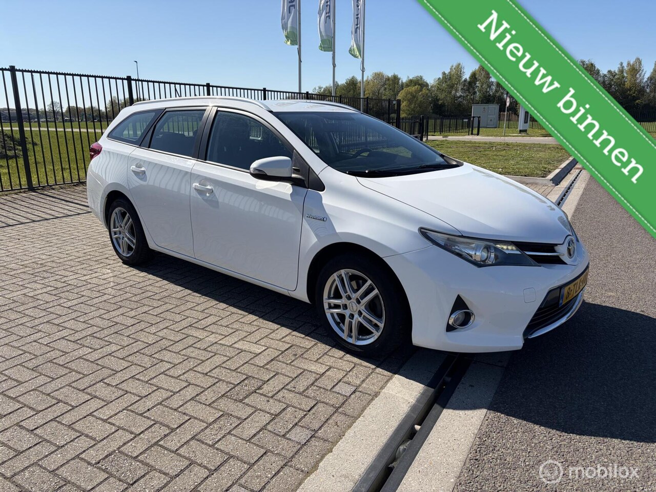 Toyota Auris - 1.8 Hybrid Dynamic 1.8 Hybrid Dynamic - AutoWereld.nl