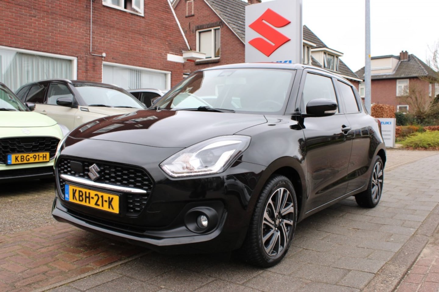Suzuki Swift - 1.2 STIJL SMART HYBR - AutoWereld.nl