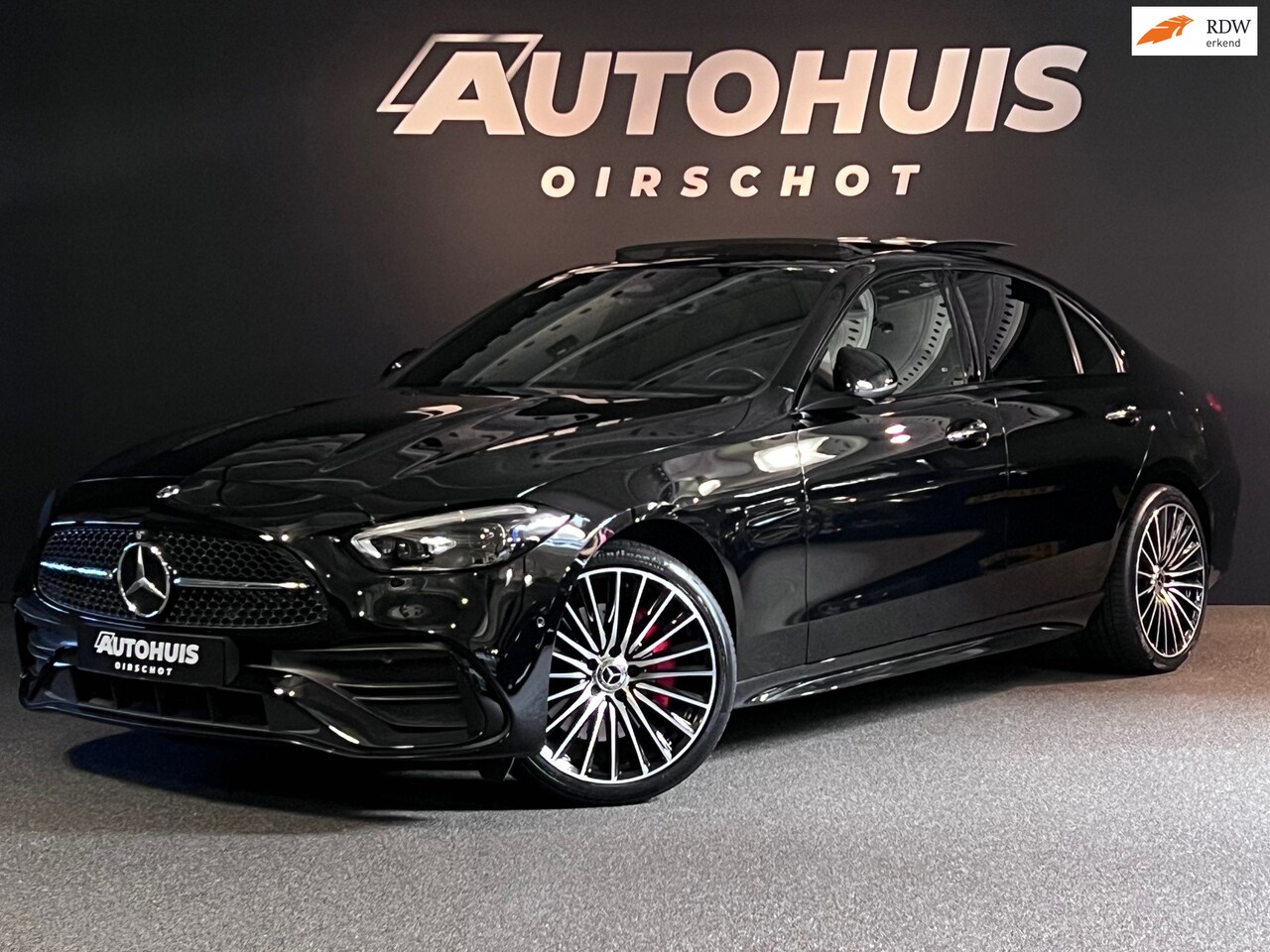 Mercedes-Benz C-klasse - 300 e AMG Line Pano/Memoryseats/360Camera/19"/HeadUp/Keyless/Ambience - AutoWereld.nl