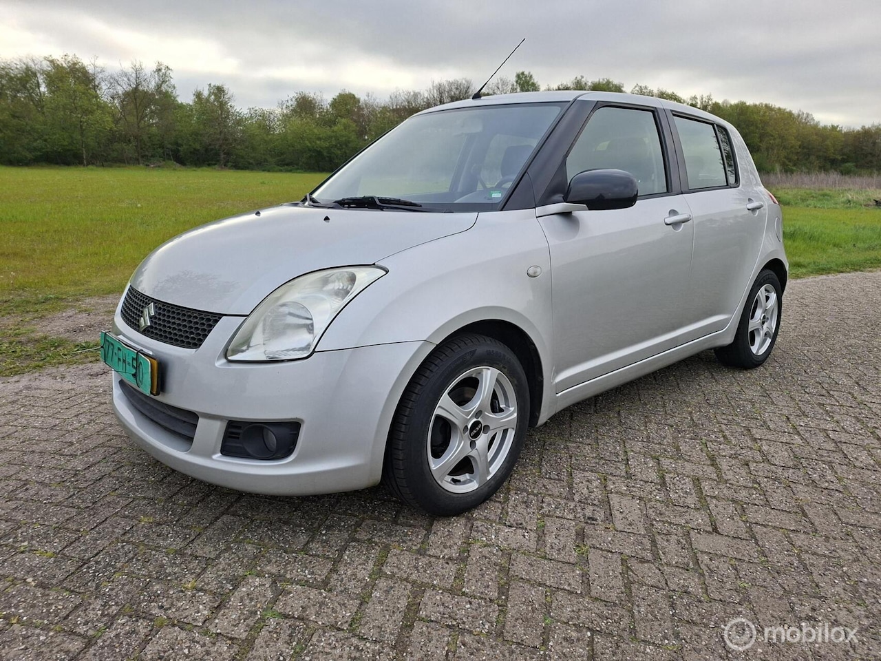 Suzuki Swift - 1.3 Shogun 2009 weinig km nw apk trekhaak - AutoWereld.nl