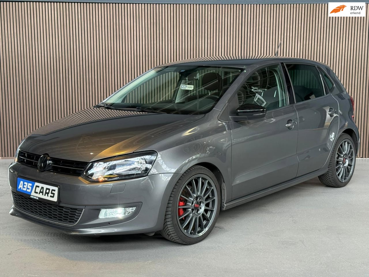 Volkswagen Polo - 1.2 TSI Highline MATCH|STOELVERWARMING|CRUISE|PDC|ALL SEASON BANDEN - AutoWereld.nl