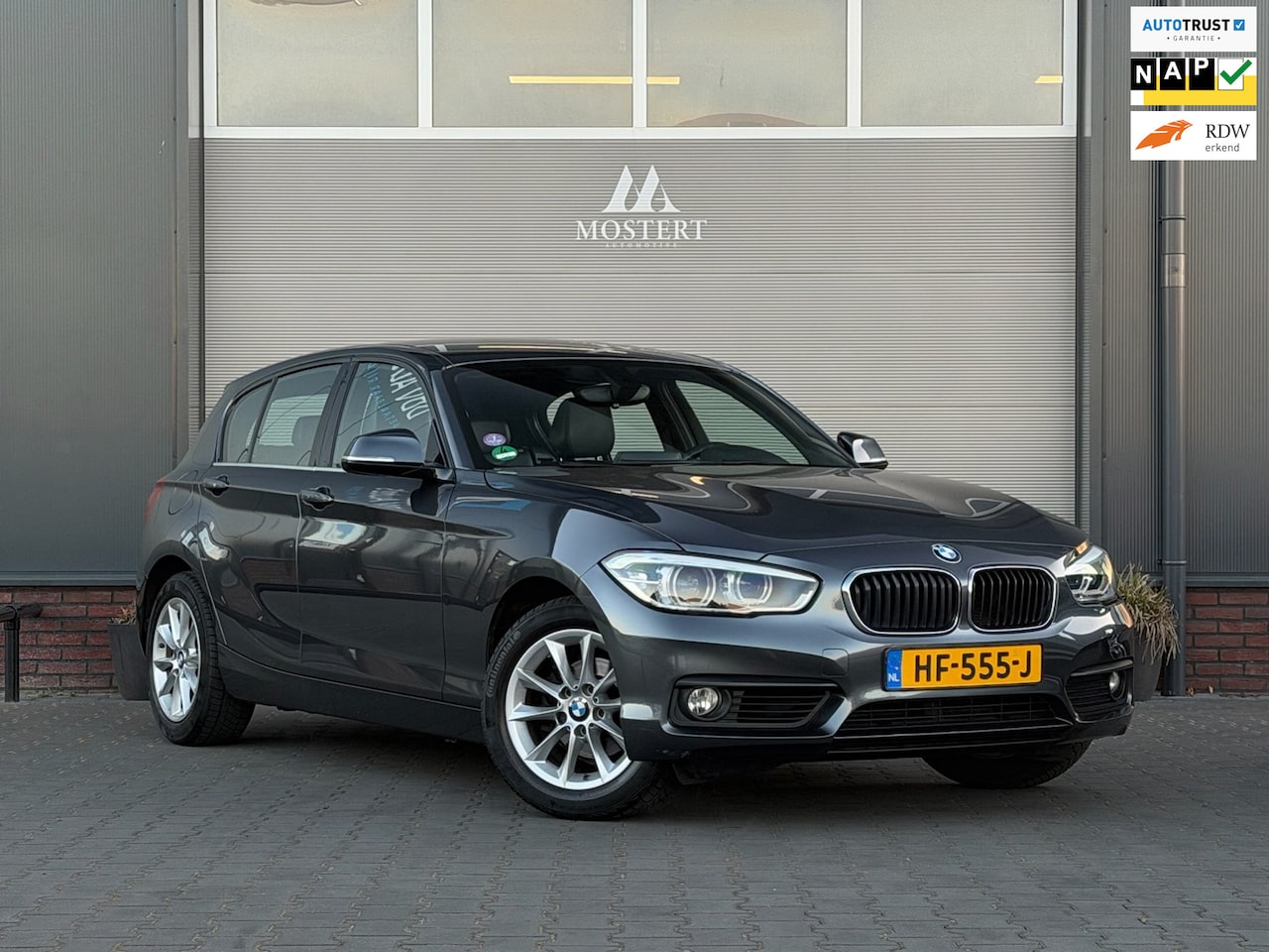 BMW 1-serie - 118i/136pk Essential|2015|Automaat|NAP|H&K|Leder|Clima|Zwarte hemel|16" LMV - AutoWereld.nl