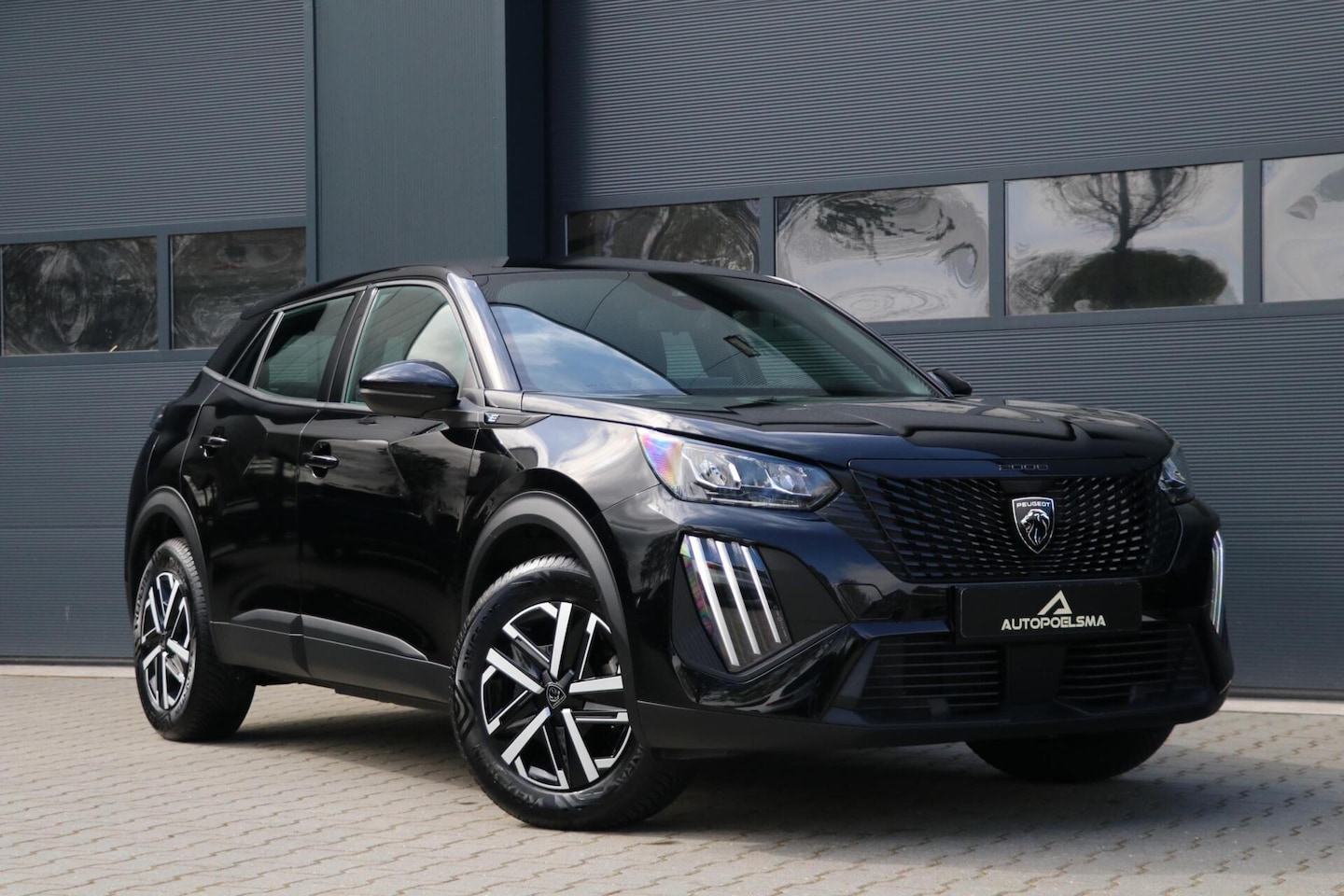 Peugeot e-2008 - EV Active 54 kWh |Warmtepomp|3 Fase| AppleCarplay|Camera| PrivacyGlass 42000KM BJ2024 - AutoWereld.nl