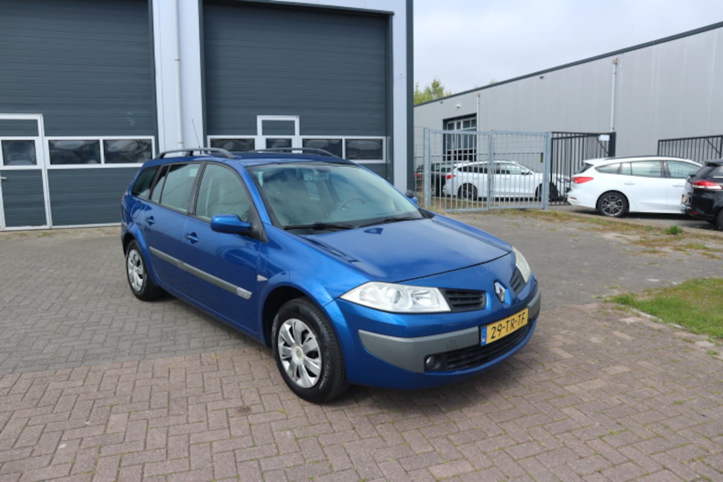 Renault Mégane Grand Tour - 1.6-16V Business Line LPG-G3 - AutoWereld.nl
