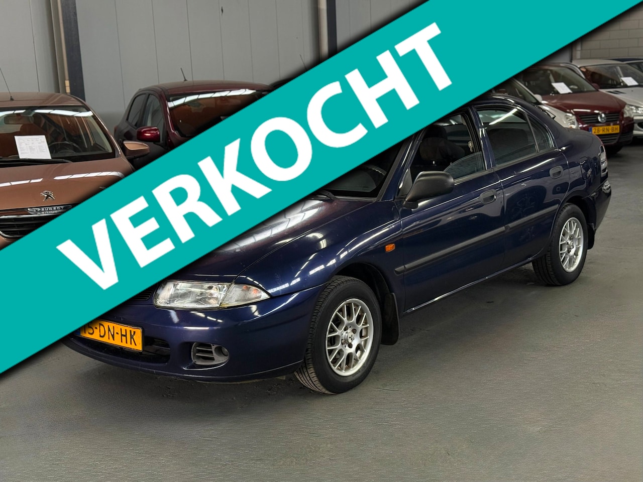 Mitsubishi Carisma - 1.6 GL Royal Class 1ste Eigenaar APK NAP - AutoWereld.nl
