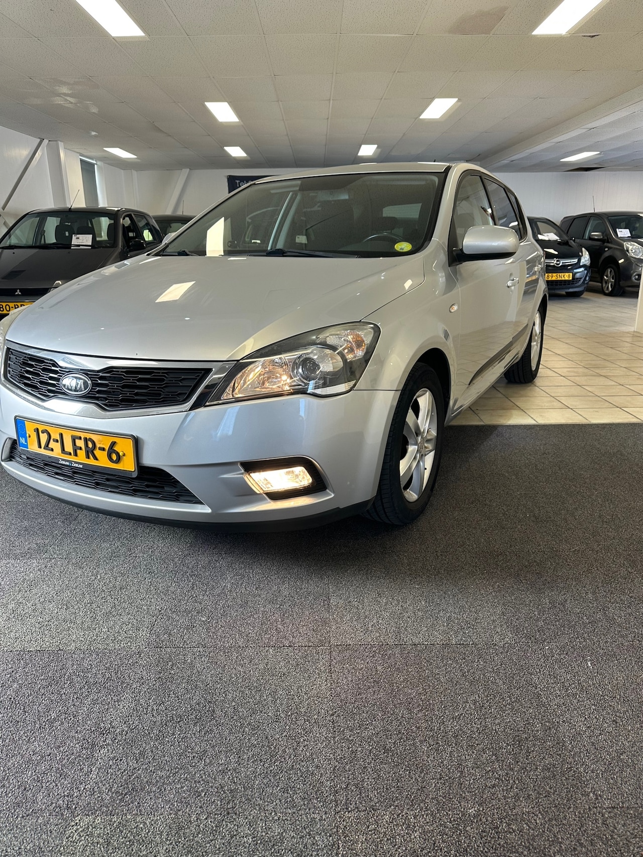 Kia Cee'd - 1.4 CVVT Seven 1.4 CVVT Seven - AutoWereld.nl