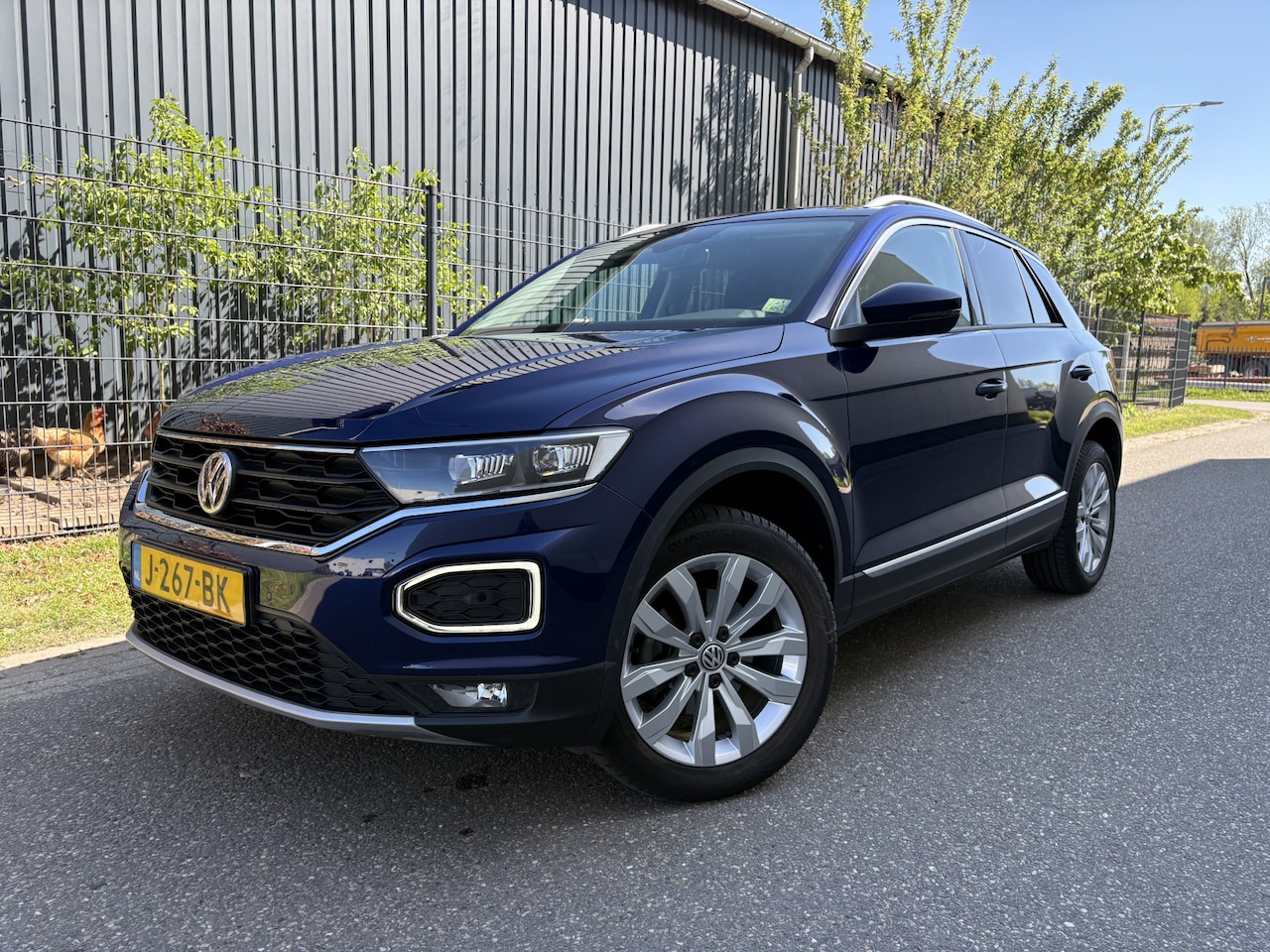 Volkswagen T-Roc - 1.5 TSI Sport / AUTOMAAT / NAVI / CRUISE / 32dkm! NAP! / CARPLAY - AutoWereld.nl