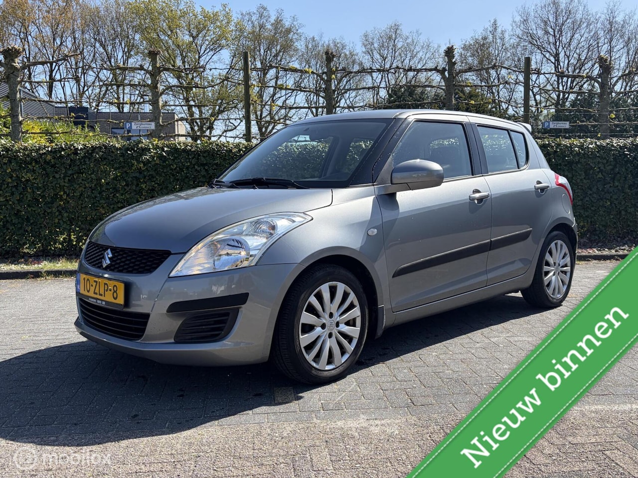Suzuki Swift - 1.2 Bandit 1e EIGENAAR / VOLLEDIG DEALER O.H. / AIRCO / CRUISE / STOELVERW. / TR.HAAK / LM - AutoWereld.nl
