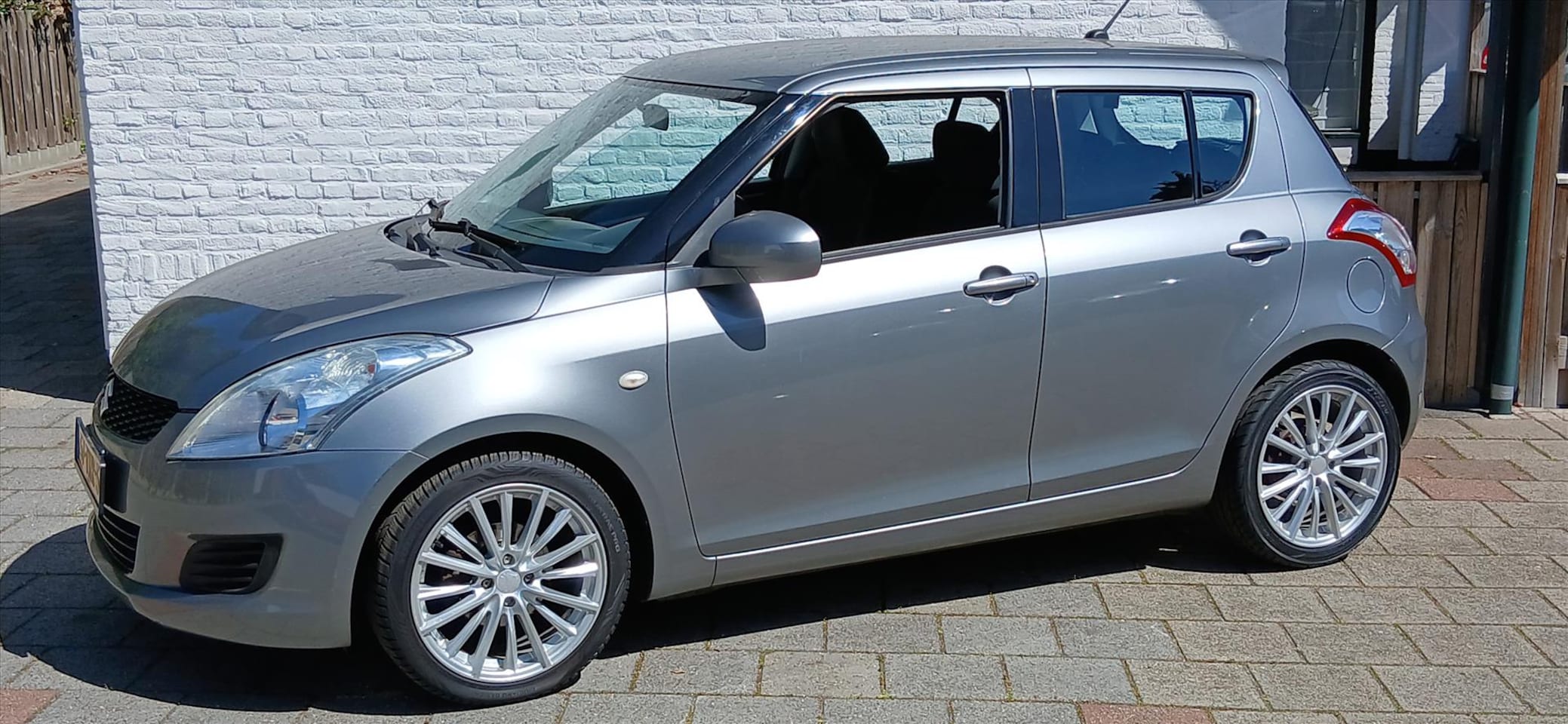 Suzuki Swift - 1.2 5drs comfort airco lmv 17 inch zeer mooie auto. - AutoWereld.nl