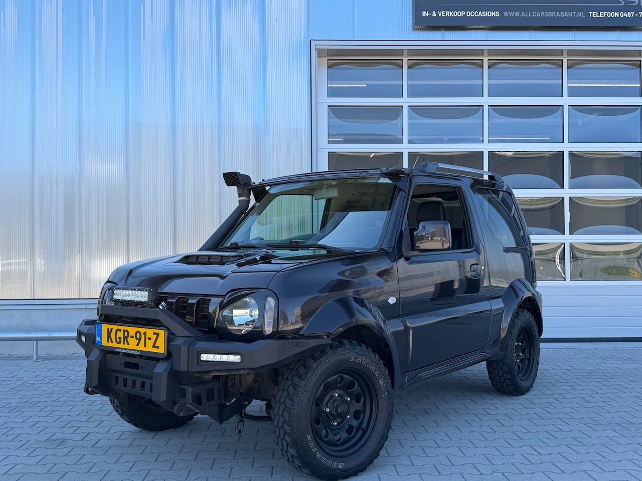 Suzuki Jimny - 1.3 Exclusive / leder /4x4 /automaat/ G3 gas - AutoWereld.nl