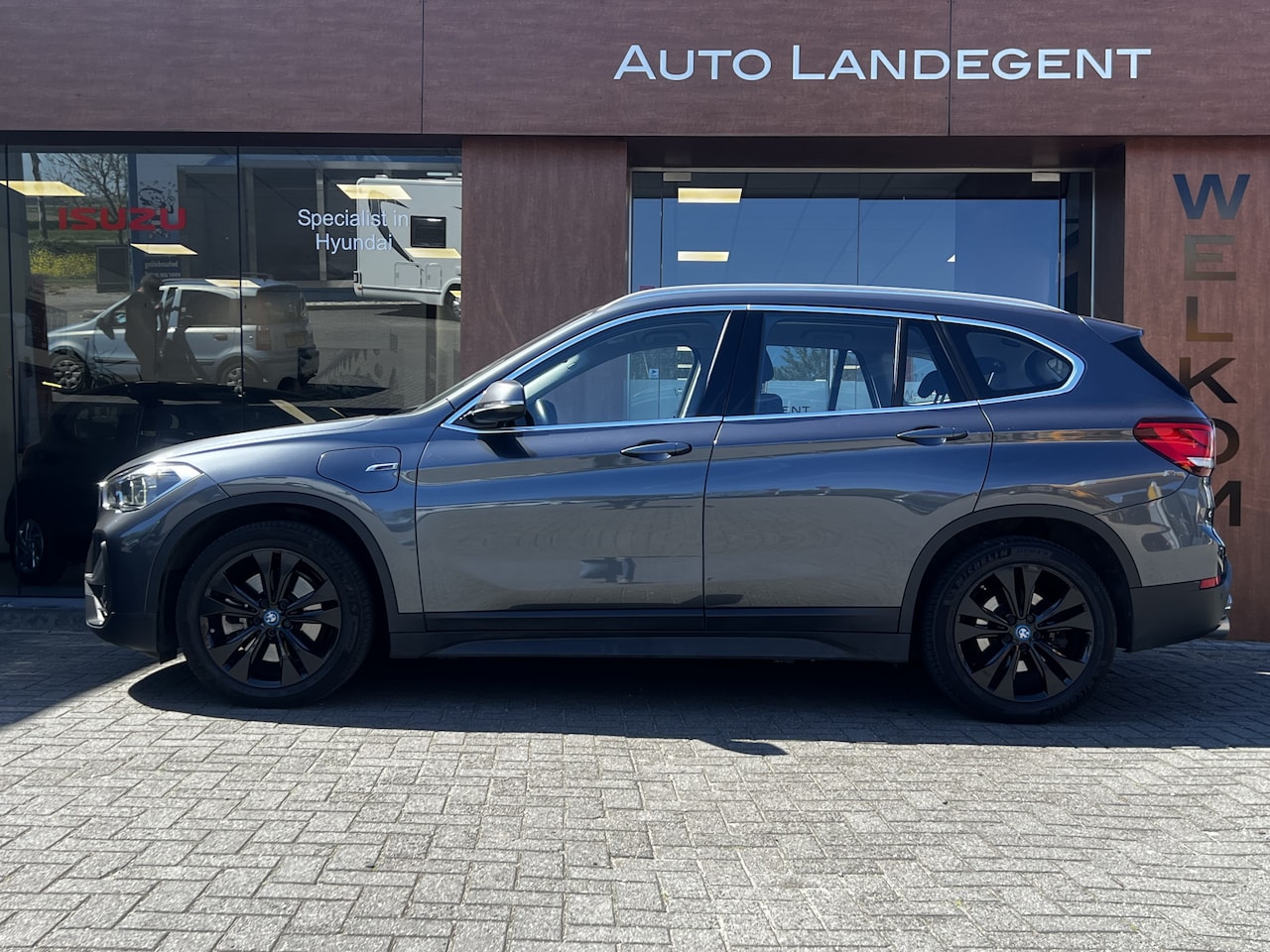 BMW X1 - xDrive25e eDrive Edition PHEV | Camera | NAV | Cruise control | Trekhaak - AutoWereld.nl