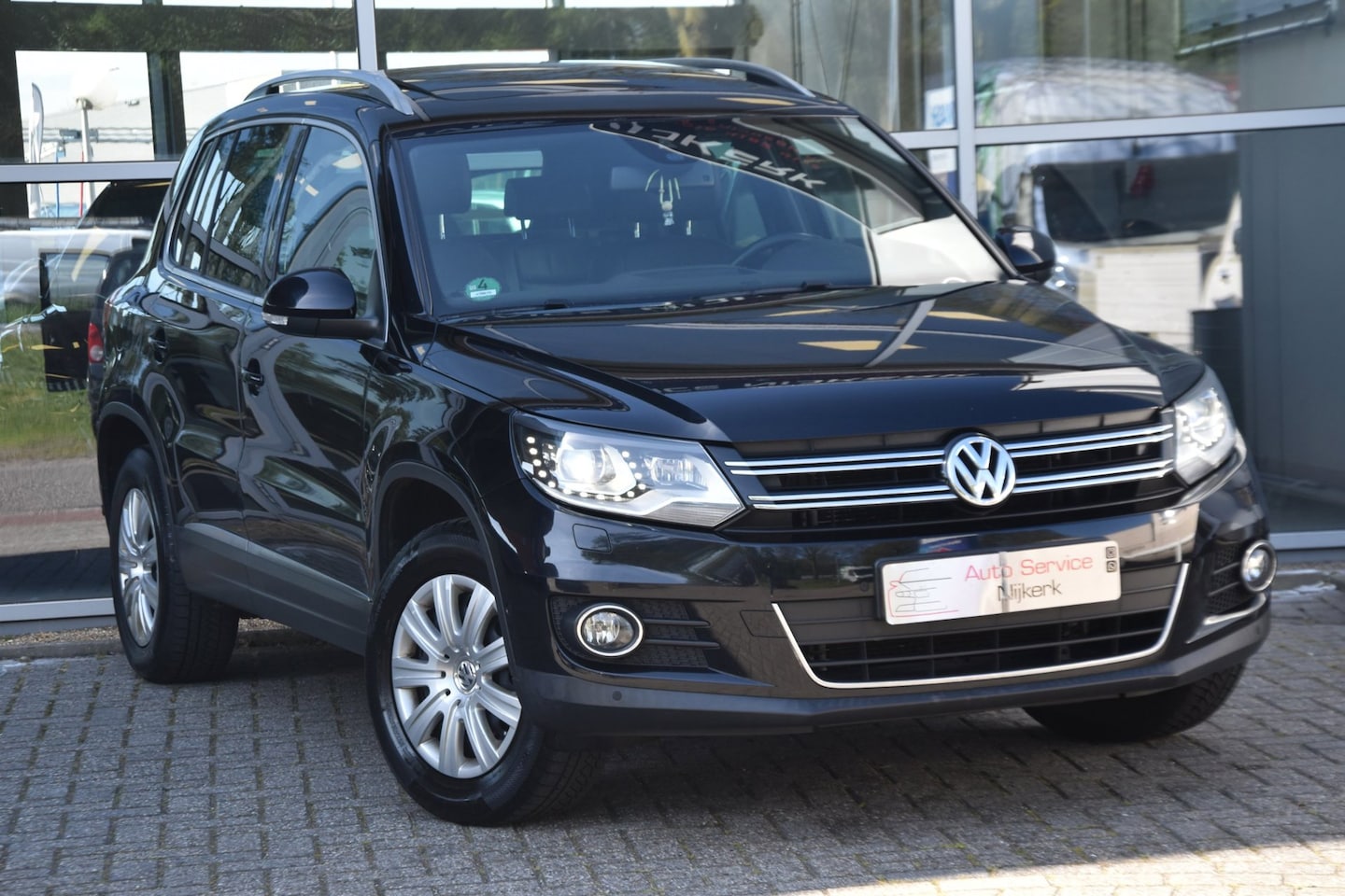 Volkswagen Tiguan - 2.0 TSI Sport&Style 4Motion Aut. Leder Trekhaak Pdc - AutoWereld.nl