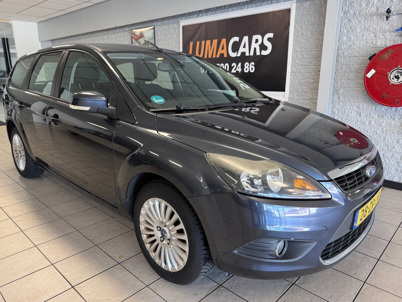 Ford Focus Wagon - 1.6 Titanium | Airco |Navi | Elekrtr.|NAP| - AutoWereld.nl