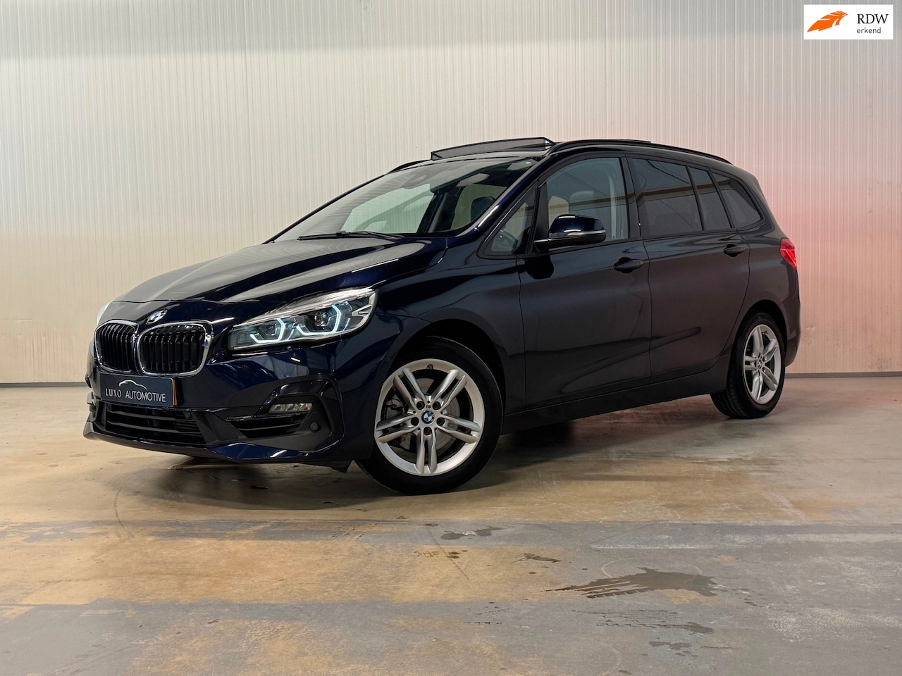 BMW 2-serie Gran Tourer - 218i High Executive | PANO | TREKHAAK | ACC | LED | CAMERA | LEDER - AutoWereld.nl