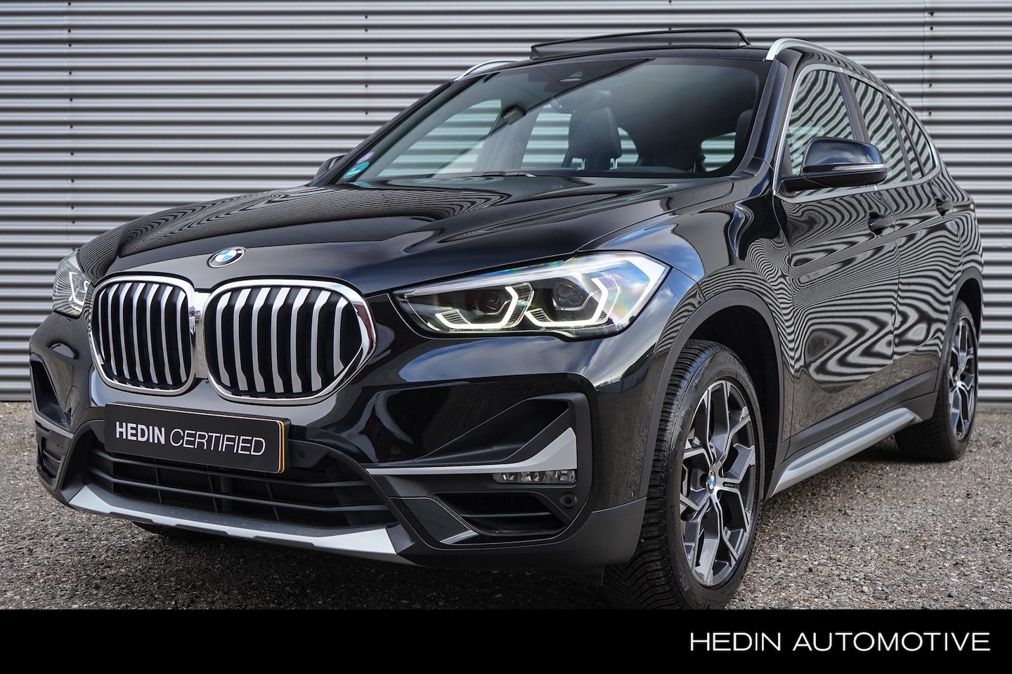 BMW X1 - sDrive20i VDL Nedcar Edition / Nederlandse Auto / Electrisch schuifdak / Navigatie / Parke - AutoWereld.nl
