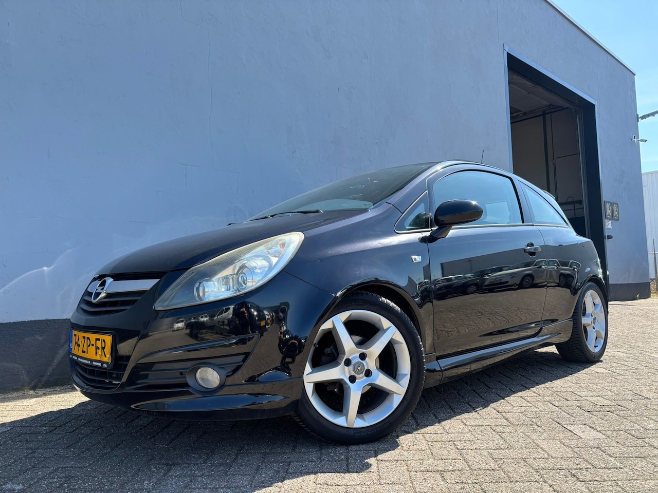 Opel Corsa - 1.4-16V Sport - Airco - LMV - AutoWereld.nl