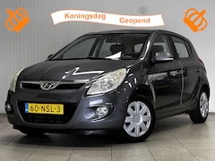 Hyundai i20 - 1.2i i-Motion/ 5-Drs/ Airco/ Elek. pakket/ C.V. Afstand/ Isofix/ Radio-CD AUX & USB/ Multi