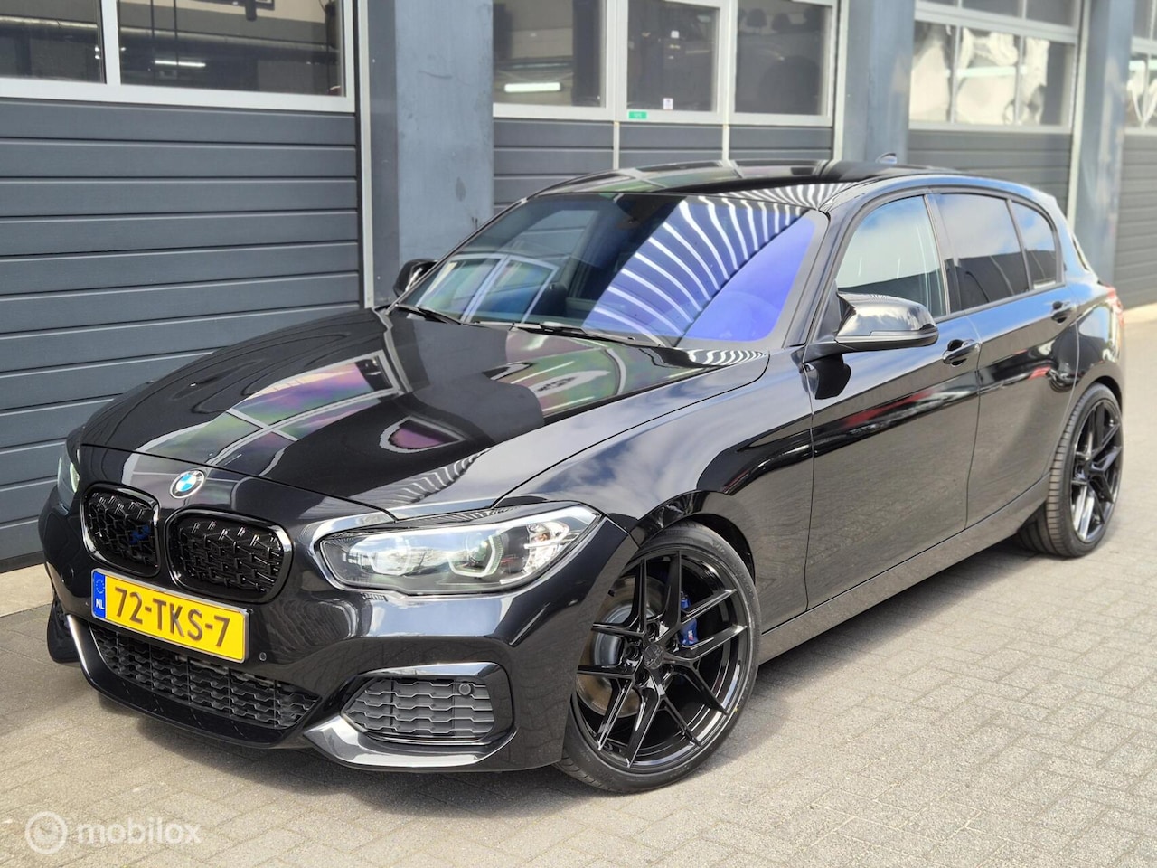 BMW 1-serie - 116i Sport M140i Automaat | LED | 19'' | STOEL.V | VERLAAGD | PDC | - AutoWereld.nl