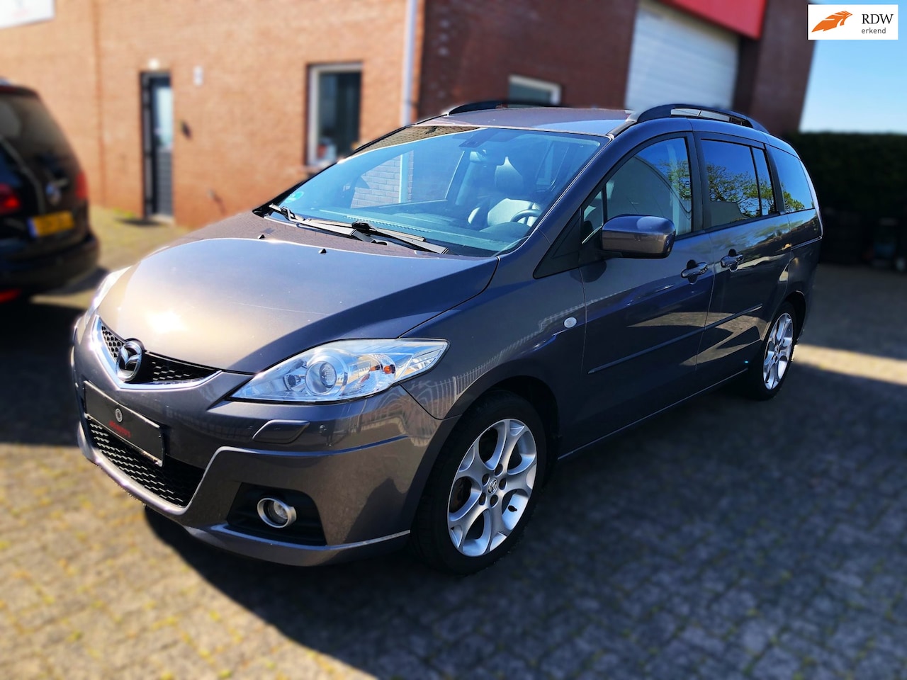 Mazda 5 - 2.0 146pk/ 7zits/ VOL LEER/ PDC - AutoWereld.nl