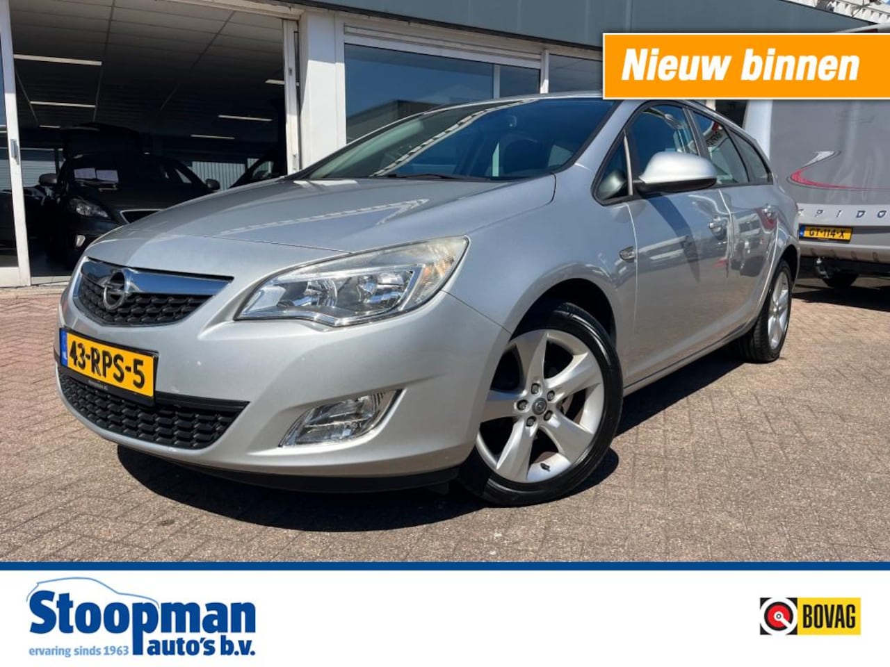 Opel Astra - 1.4 T Edition Airco Cruise Navi PDC - AutoWereld.nl