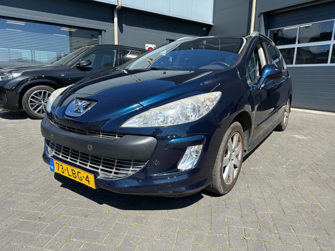 Peugeot 308 - 1.6 VTi met trekhaak, PDC, cruise control, navigatie, APK 03-2027 - AutoWereld.nl