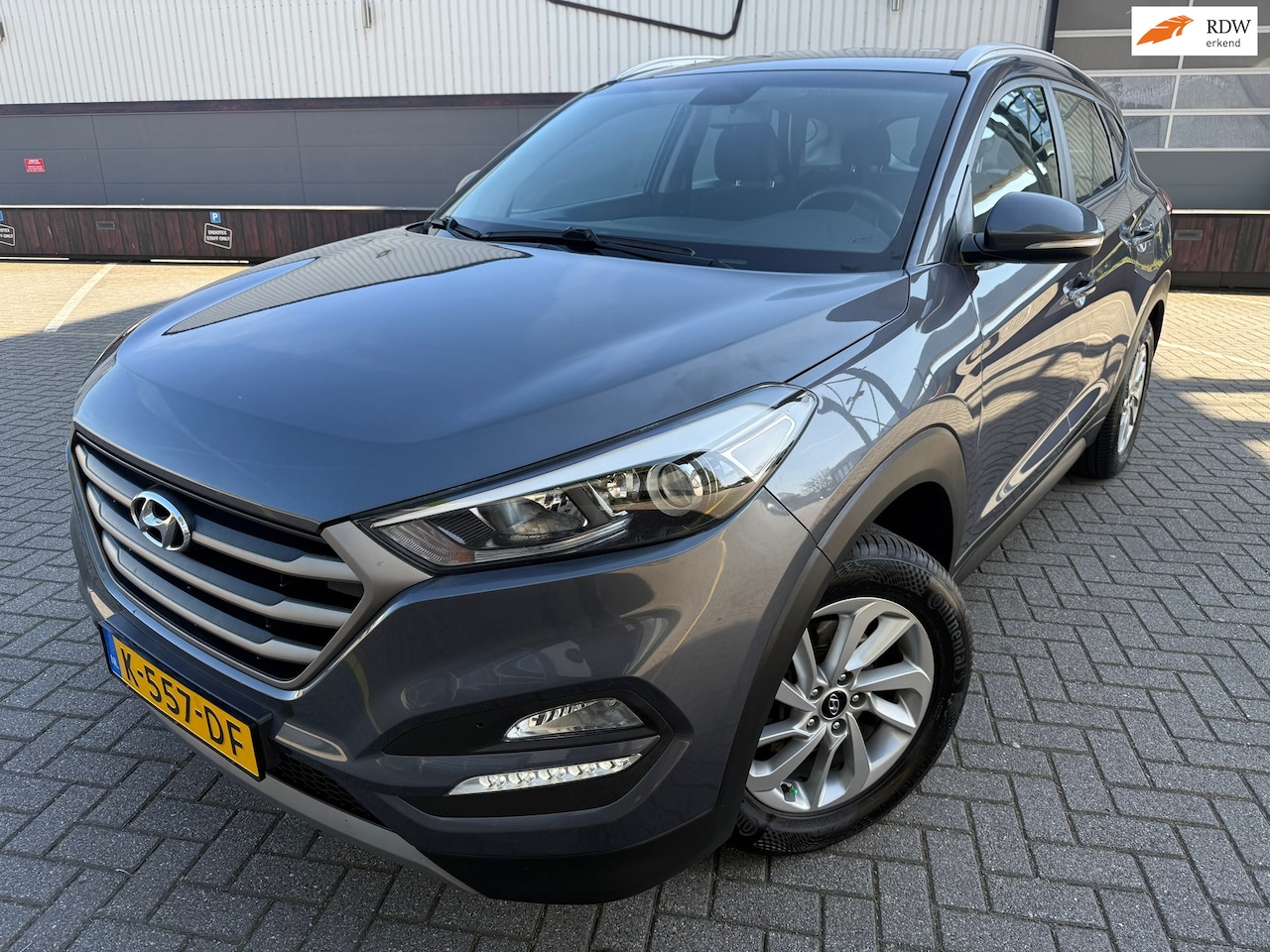 Hyundai Tucson - 1.6 GDi Comfort*CRUISE*NAVI*STOEL VEREWARMING*CAMERA*TERKHAAK - AutoWereld.nl