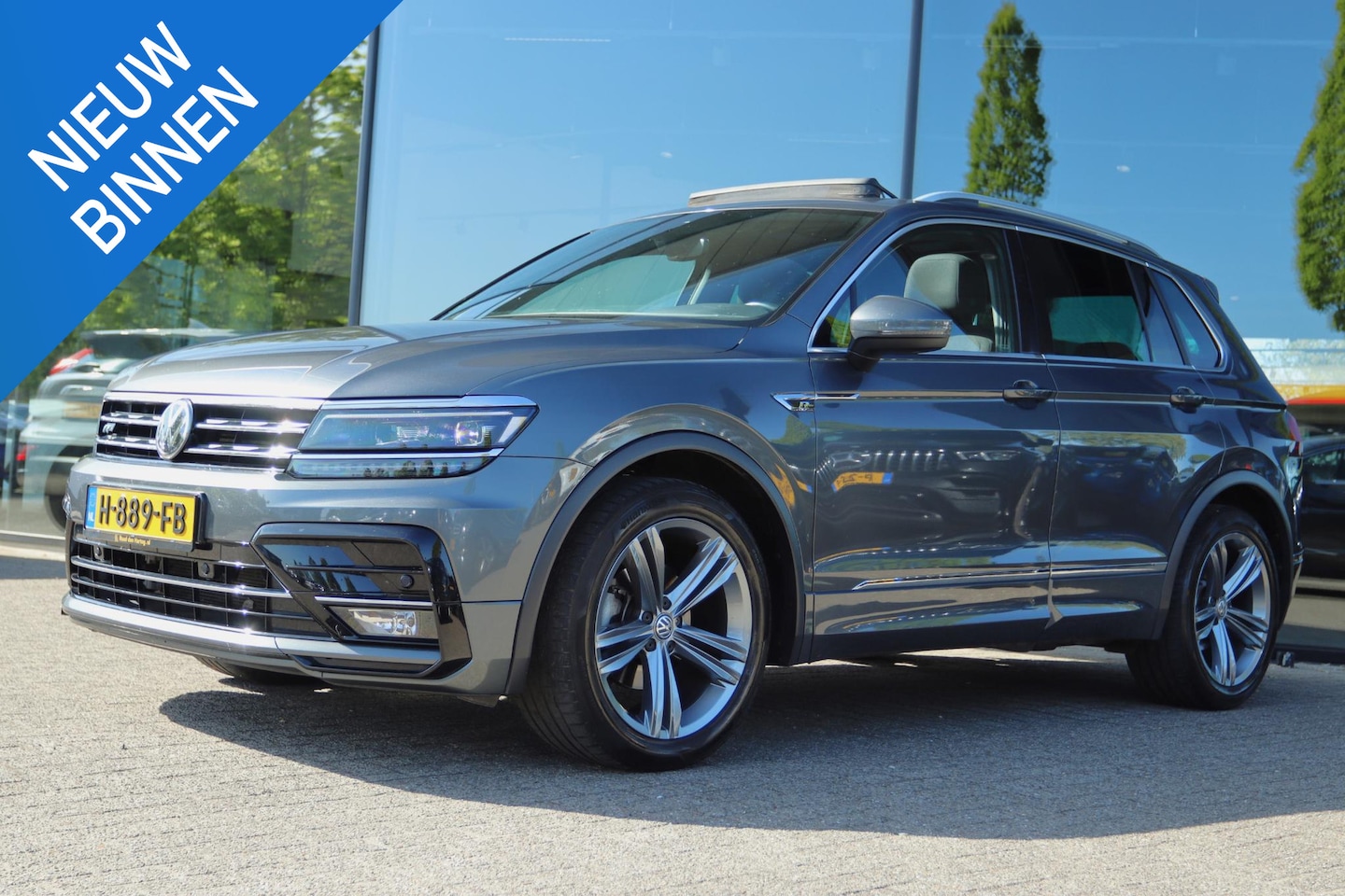 Volkswagen Tiguan - 1.5 TSI ACT AUT. R-LINE HIGHLINE BUSINESS | PANO | VIRT. COCKPIT | TREKHAAK | CARPLAY | CA - AutoWereld.nl
